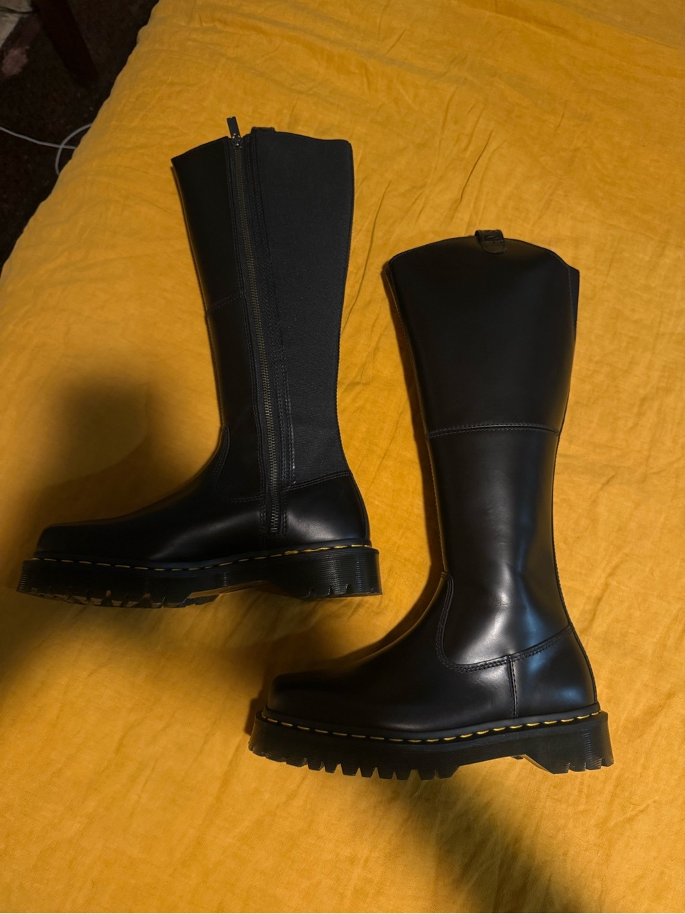 Dr. Martens Black Over-the-Knee Lug Sole Boots with Yellow Stitching